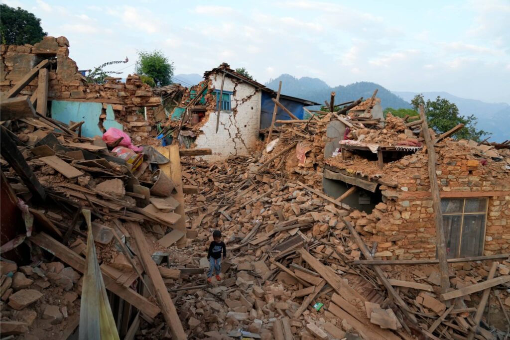 A child in the rubble of Nepal earthquake