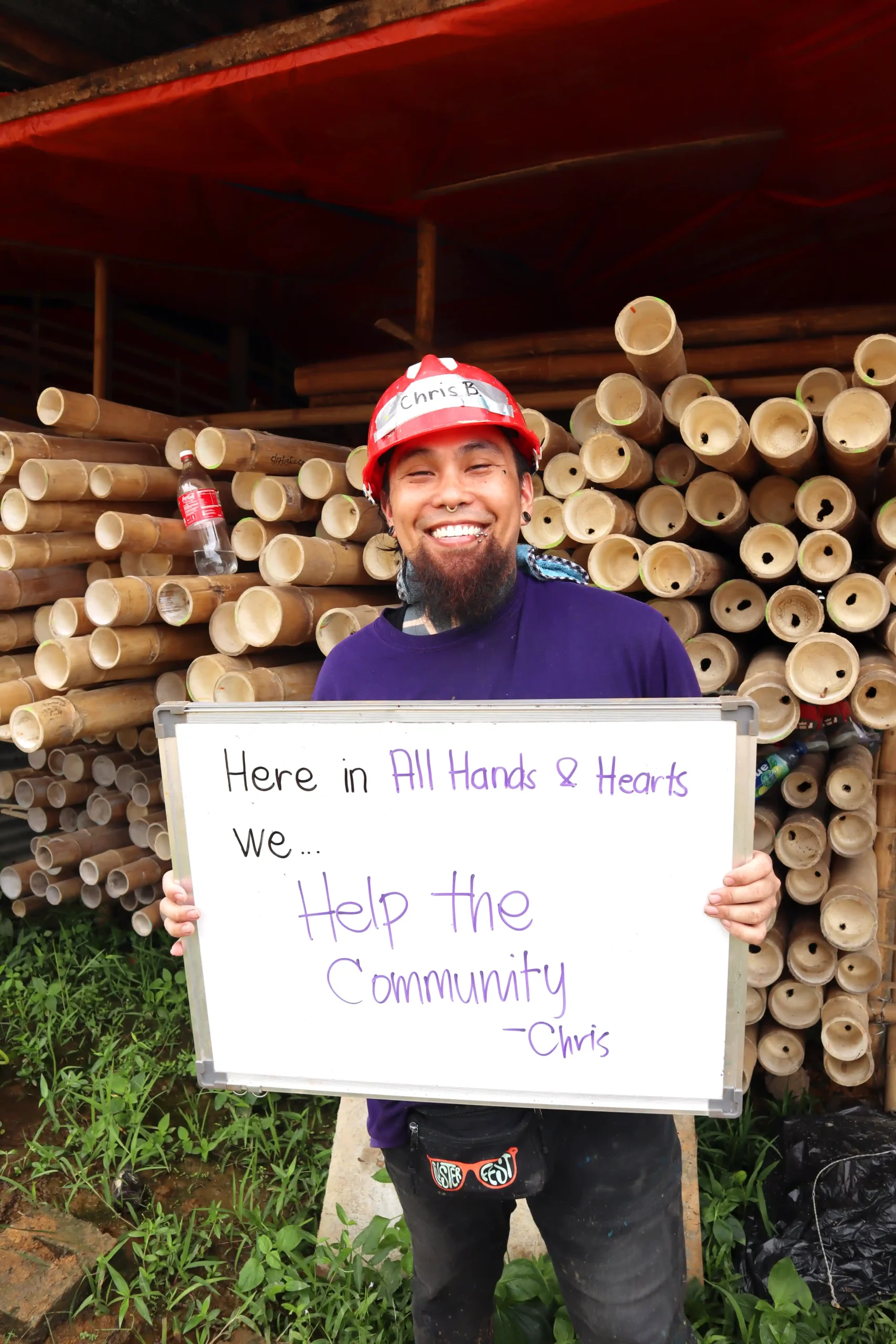 Volunteer Holding a board with a motivanional phrase