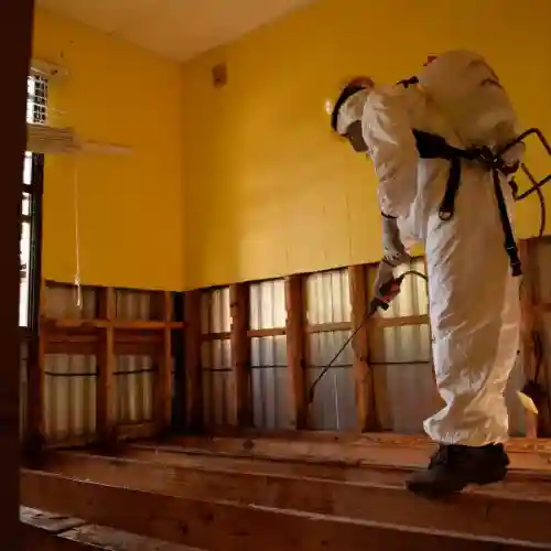 Worker fixing home in North Carolina