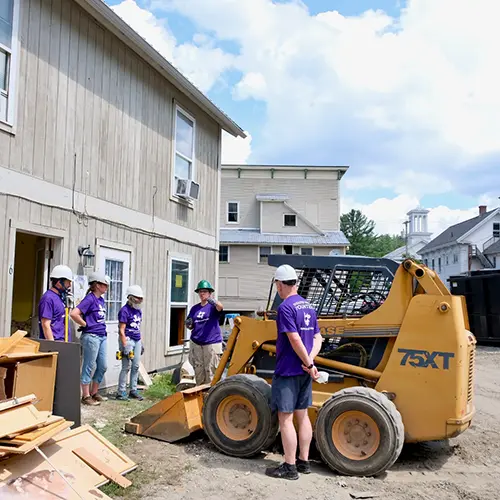 Northeast vermont volunteers with machinery
