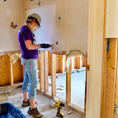 Northeast Vermont Volunteer fixing house