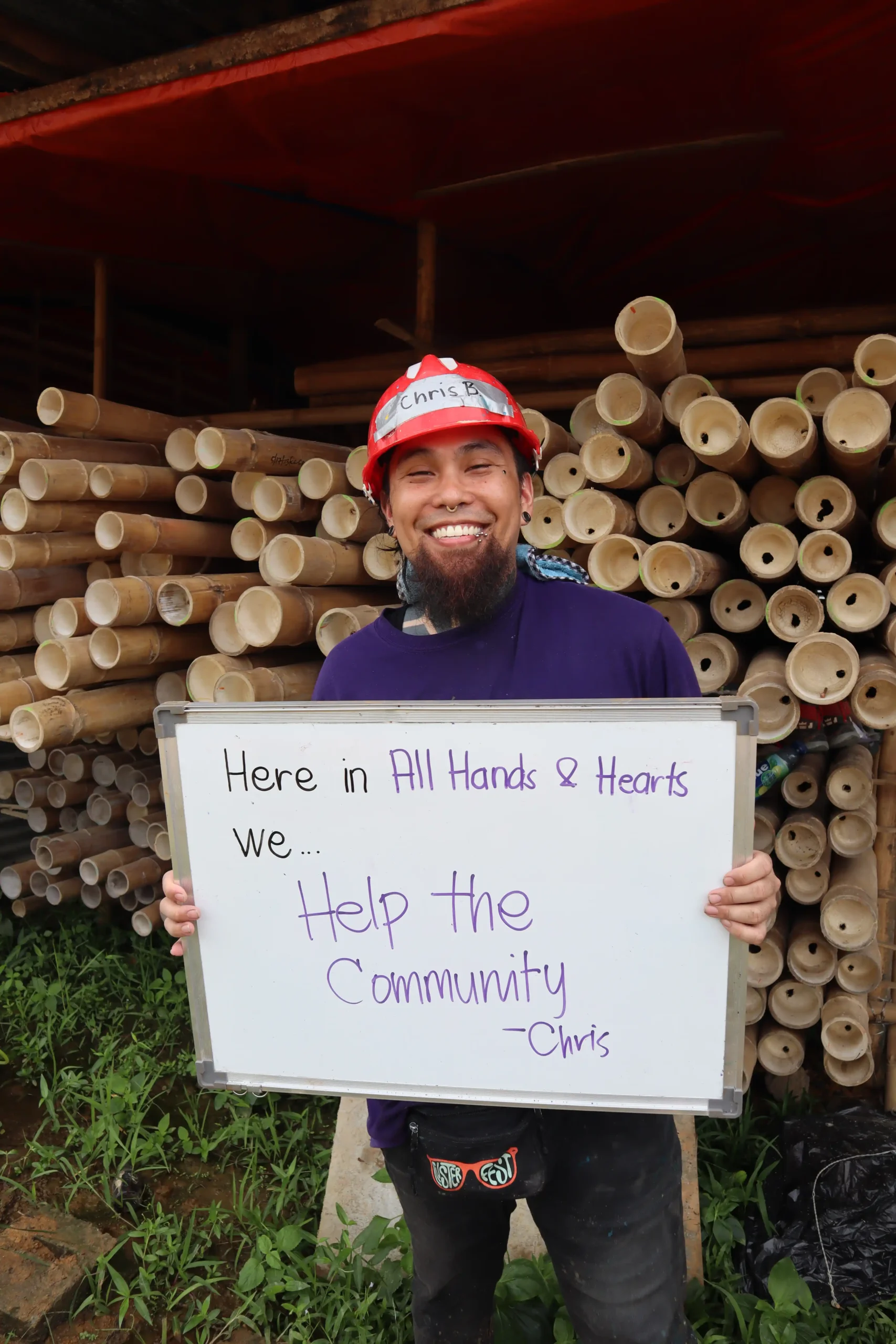 Volunteer Holding a board with a motivational phrase