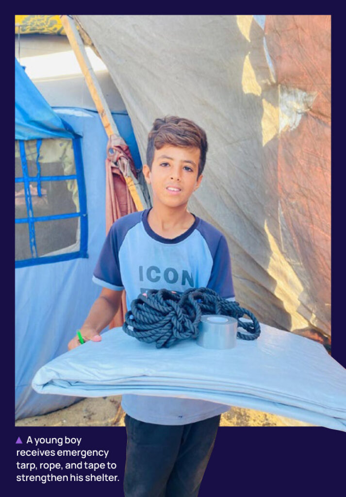 Image of a young boy holding tarp, rope and duct tape