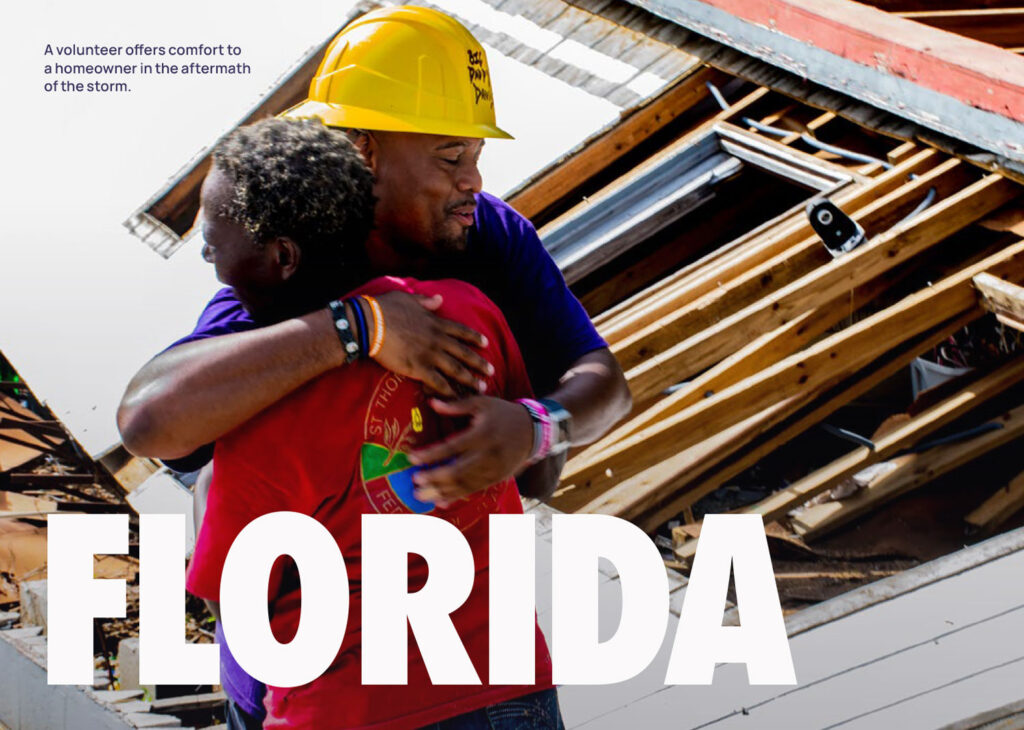 A volunteer offers comfort to a homeowner in the aftermath of the storm.